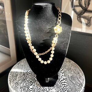 Super chic faux pearl and gold layered necklace.